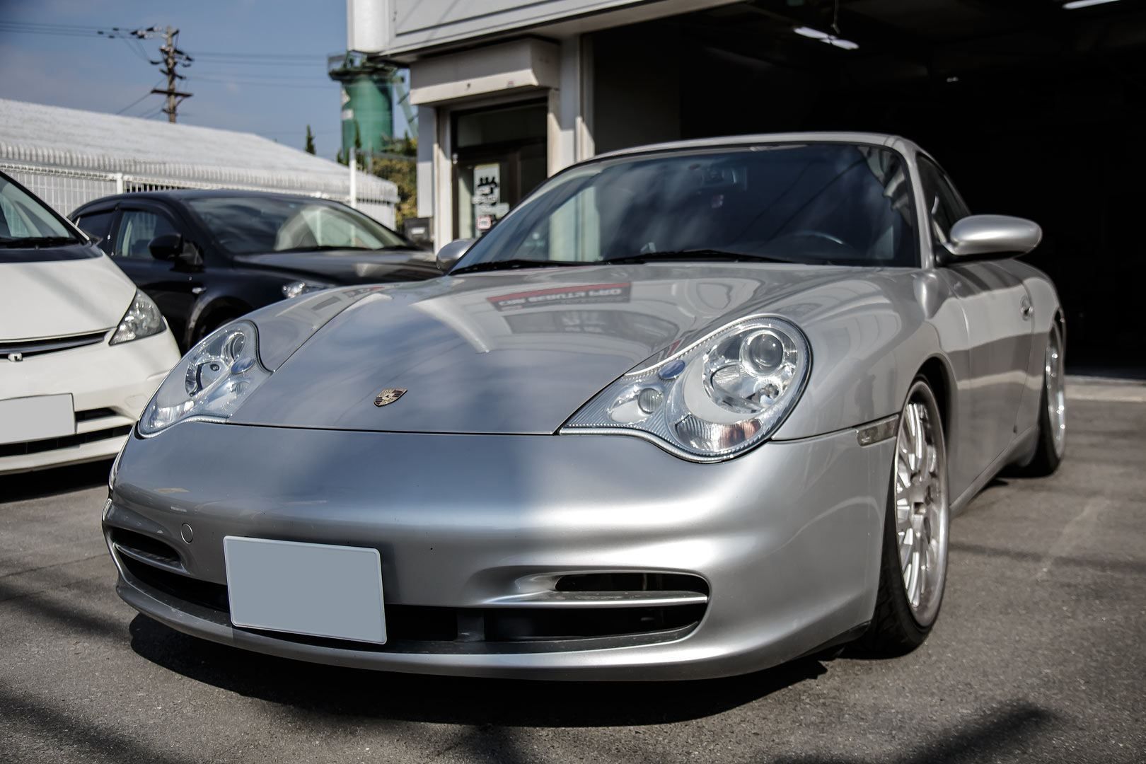 ヘッドライト磨き　黄ばみや白濁したヘッドライトの正しい磨きで美しく PORSCHE996